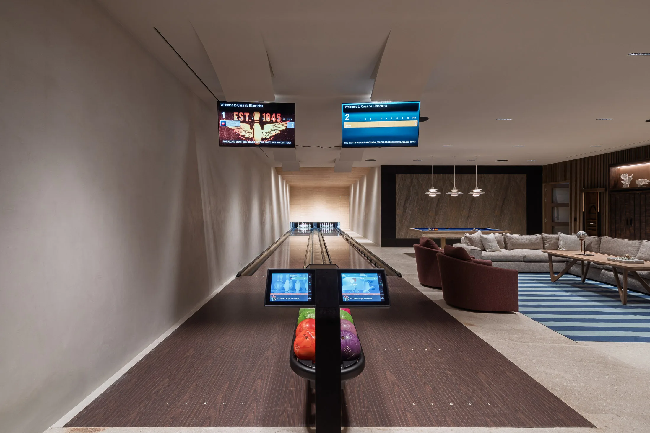 Straight down the two private lanes — Welcome to Casa de Elementos on the screens