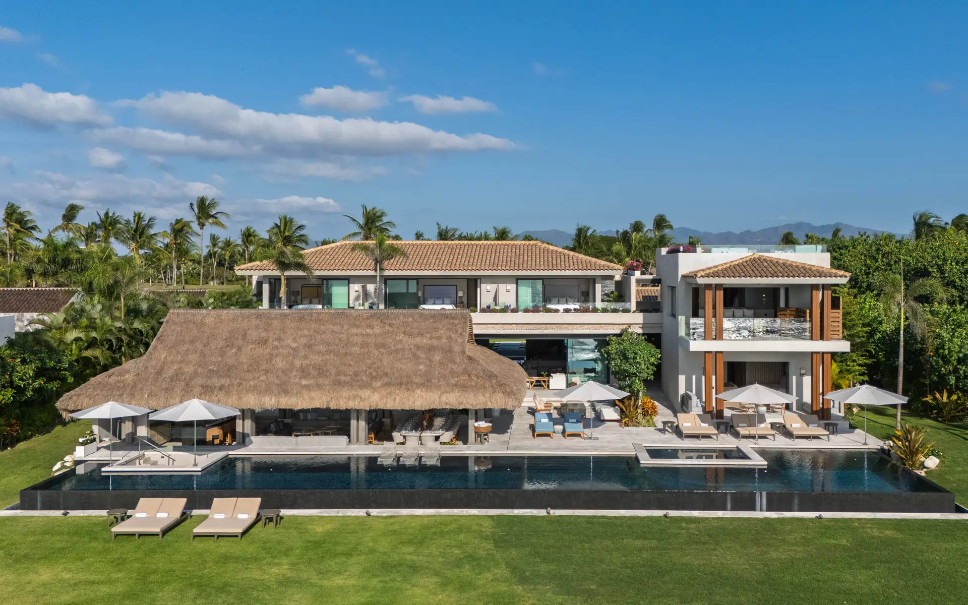 Casa de Elementos — the beachfront estate, pool and palapa above the Pacific